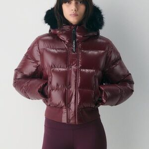 Aritzia Plum Burgundy Super Chalet Puffer Jacket with Black Faux Fur Hood NWT S